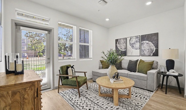Living Room with a gray couch with a coffee table