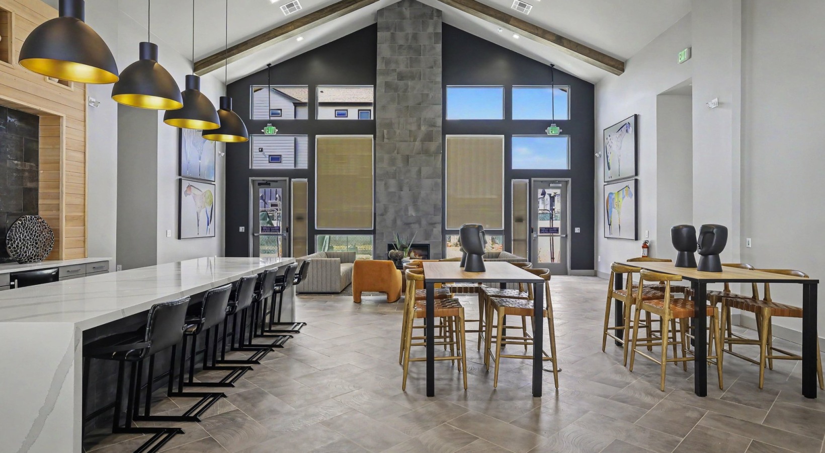 Clubhouse Lounge with tables, kitchen and games. 