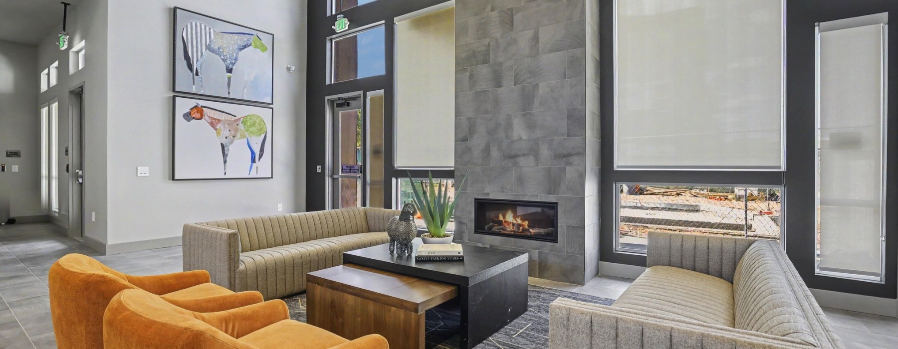Clubhouse with lounge seating and fireplace