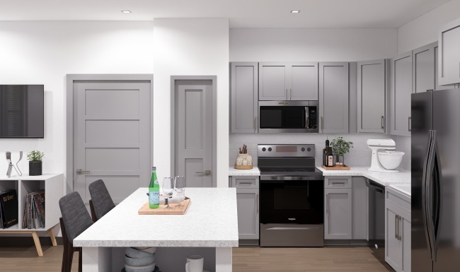 a kitchen with white countertops